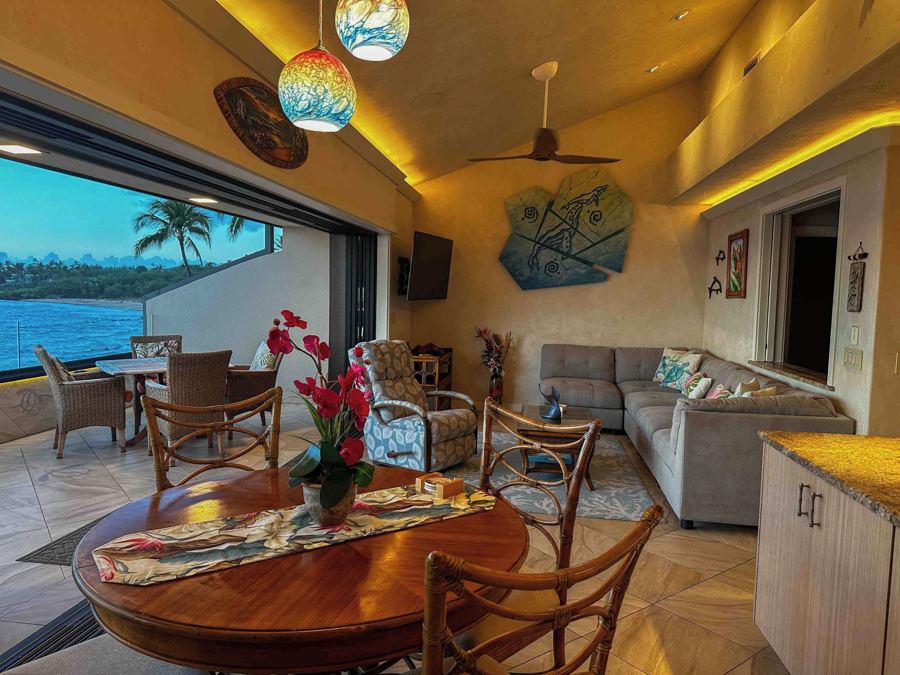 Dining table, living room and the outdoor table on the lanai